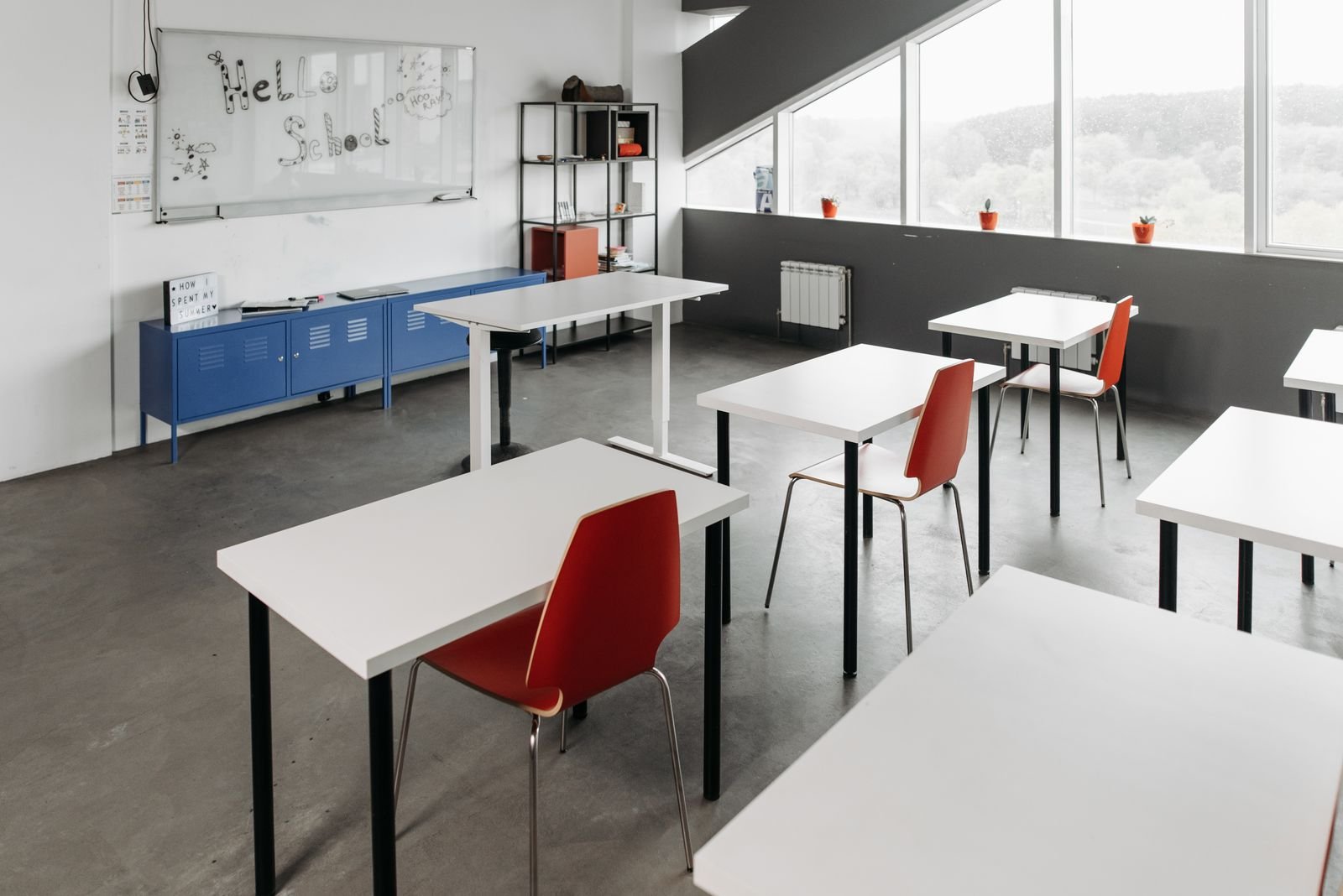 Classroom desks and chairs with metal frames